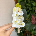 Porta-guardanapo galho mini orquídeas brancas